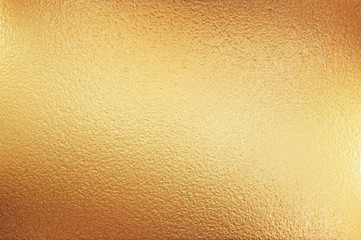 Gold flakey foil texture used as background
