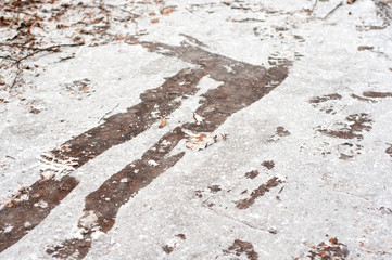 ice under the snow. how much is dangerous for a pedestrian