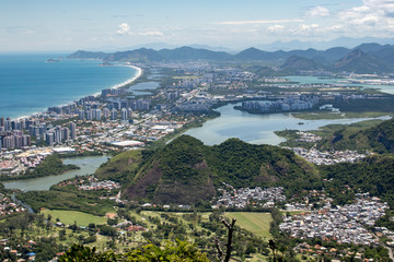Barra da Tijuca neighbourhood with city lake, high rise buildings and golf club course in the foreground seen from the Pedra Bonita rock in the Tijuca forest