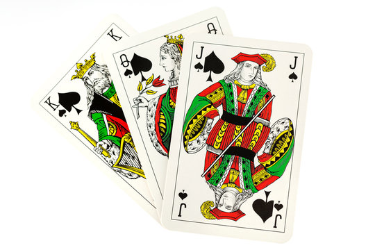 Playing Cards; Suit of Spades, Clubs and Diamonds fanned out over white background. Gambling, Poker, Win, Lose, Chance, Gambling, Money, Red, Black, Jack, Queen, King