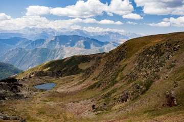 Fototapeta na wymiar Pyrenees Mountain routes, hikers and trekking