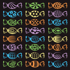 collection of various candies isolated on black background