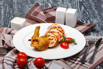 baked stuffed chicken thigh with vegetables