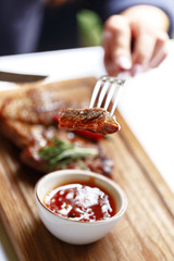 Gourmet meat meals assortment flat lay. Top view on restaurant table with menu of tasty grilled snacks. Concept for restaurant menu.