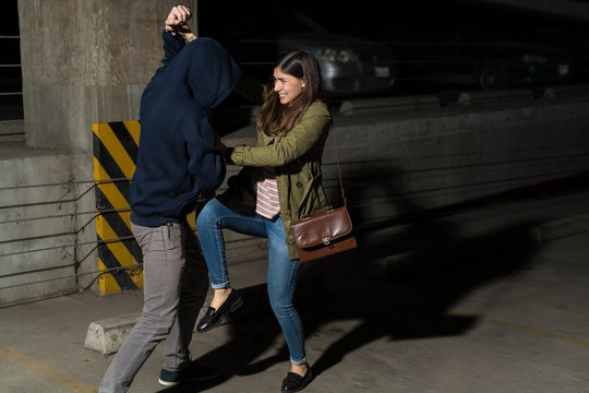 Female Victim Fighting Against Robber