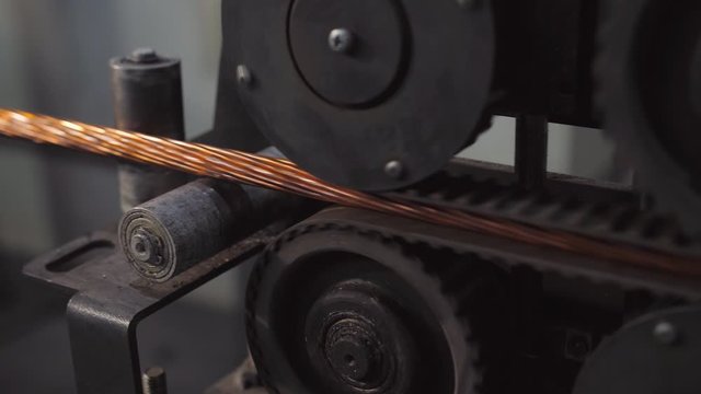 The manufacturing process of electrical cable made from copper wire. Clouce-up plan drawn copper wire.