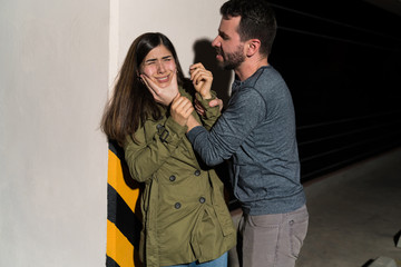 Man Abusing His Girlfriend In Alley