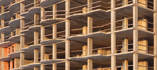 Unfinished cement building at a construction site