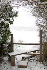 Winter Snow Scene with Wooden Stile in UK