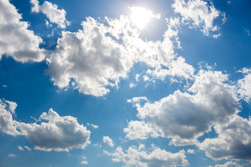 Naklejka na ściany i meble Clouds on blue sky, nature background.