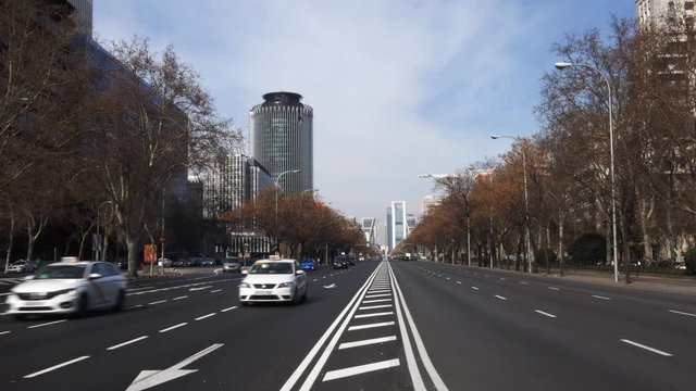 View of the Passeo de la Castellana, a wide boulevard in central Madrid