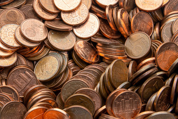 One, two euro cents coins on dark background. European money.