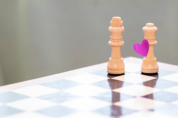 Chess pieces on the board, white and black. Game and life.