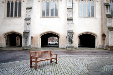 Fototapeta na wymiar Bench on a square, Lincoln's Inn Chapel, London, UK