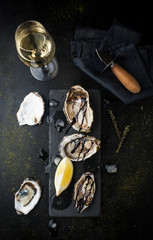 Fresh oysters with lemon and a glass of wine