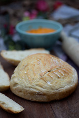 Artisan bread sliced and spread with vegan carrot pate