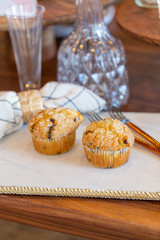 Muffins on modern marble serving board