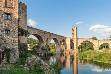 Fototapeta na wymiar Romanesque defensive bridge over the Fluvia River in Besalu, Catalonia.