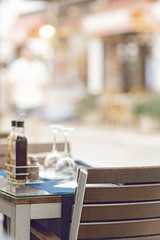 Chairs and tables on a patio in restaurant.