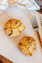 Muffins on modern marble serving board