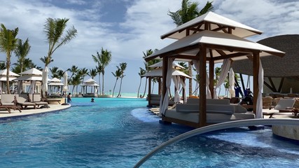 Luxury pool in tropical holiday resort, romantic vacation in the Caribbean sea, exotic and carefree...
