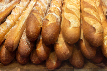 freshly baked bread at a market stall. assortment of baked bread