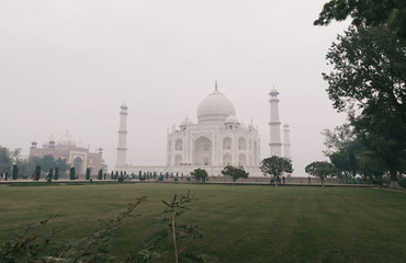 Obraz premium Taj Mahal Scenic view with foggy weather. A UNESCO World heritage site at Agra, India.