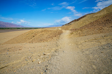 hikink the golden canyon - gower gulch circuit in death valley, california, usa