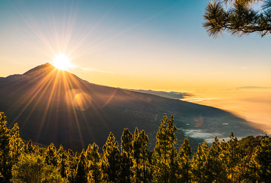 Sunset behind Mount Teide, seen from Mirador de Chipeque viewpoint. Tenerife, Canary Islands, Spain.