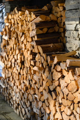 Log firewood stacked on top of each other.