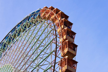 Big color ferris wheel with blue sky background