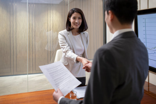 Young Chinese businesswoman in job interview