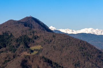Fototapeta premium Winter view form Osolnik towards Lubnik and Triglav