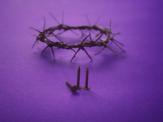 Good Friday, Lent Season and Holy Week concept - A woven crown of thorns on purple background.