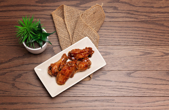 wings on a wooden background