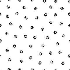 Vector seamless pattern of black paw prints.