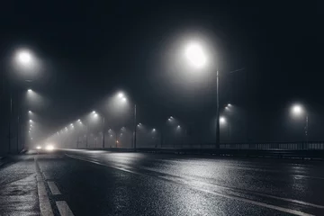  Foggy misty night road illuminated by street lights © Mulderphoto