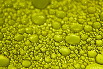 Water drops texture on yellow background