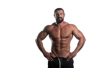 Muscular Man Posing Over White Background