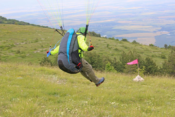 Paraglider launching from Brestovitsa in Bulgaria	