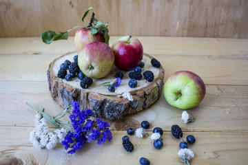 Fresh fruits. Healthy food. Mixed fruit, apples, pomegranate, banae, lemon. Studio photography of various fruits on an old wooden table. Organic healthy assorted fruits. Assortment of fresh fruit. Fru