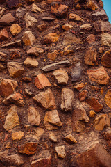 ancient stone wall. New Delhi: Qutub (Qutb) Minar