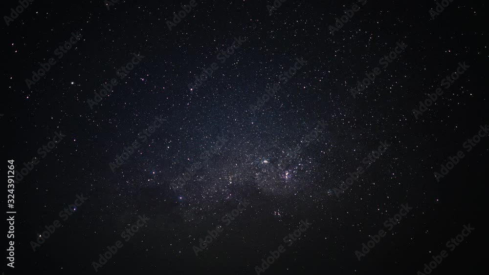 Wall mural timelapse of stars in dark sky with nebulas and galaxies visible