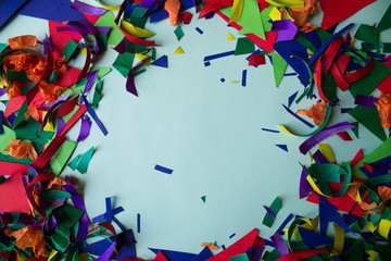 serpentine background with colored papers on a blue background