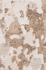 Textur der alten Mauer mit abblätternder Farbe