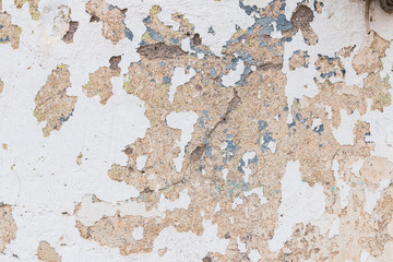 texture of old wall with peeling paint 