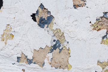 texture of old wall with peeling paint 