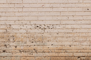 Concrete wall with brick pattern and texture