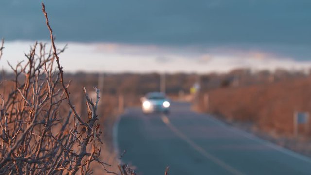 A car slowly driving along on a coastal scenic route