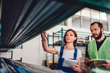 Order picker collecting products in the warehouse